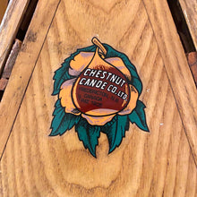 Load image into Gallery viewer, Chestnut canoe decal on a canoe deck
