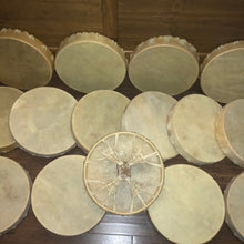 Load image into Gallery viewer, A set of handmade drums lined up.
