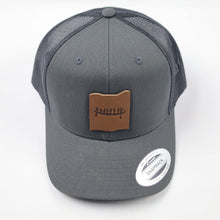 Load image into Gallery viewer, Trucker Hat with Leather Rockface and Pictograph Patch

